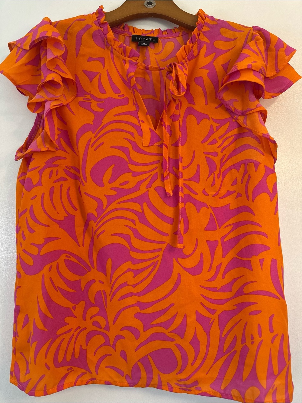 1. State Pink & Orange Ruffle Sleeve Tie-Neck Shell Top